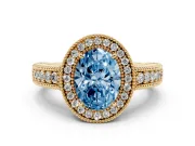 Fancy Blue Oval Cut Diamond Halo Ring Set in Yellow gold with Round Accent Halo, Pavé Band and Prong Setting