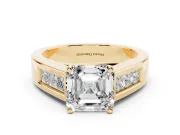 Asscher Cut Diamond Solitaire Ring Set in Yellow gold with Channel-Set Accent Stones and Prong Setting
