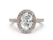 Oval Cut Diamond Halo Pavé Solitaire Ring Set in Rose gold with Prong-Set Center Stone