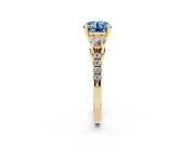 Fancy Blue Three-Stone Round Cut Diamond Pavé Band Ring Set in Yellow gold with Prong-Set Trio