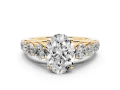 Oval Cut Diamond Solitaire Ring Set in Yellow gold with Pavé-Set Band and Prong Setting