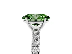 Fancy Green Oval Cut Diamond Pavé Solitaire Engagement Ring Set in Platinum with Prong Setting