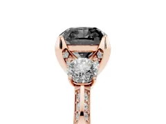 Fancy Black Cushion Cut Diamond Three-Stone Ring Set in Rose gold with Pavé Band and Smaller Side Stones