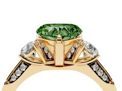 Fancy Green Heart Cut Diamond Three-Stone Ring Set in Yellow gold with Pavé Band and Smaller Side Stones