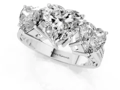 Heart Cut Diamond Three-Stone Ring Set in White gold with Textured Band