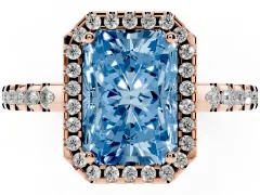 Fancy Blue Radiant Cut Diamond Halo Ring Set in Rose gold with Pavé Shoulders and Halo-Framed Center