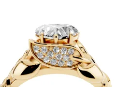 Heart Cut Diamond Leaf-Inspired Engagement Ring Set in Yellow gold with Round Accents