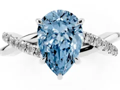 Fancy Blue Pear Cut Diamond Twisted Pavé Band Ring Set in Platinum with Prong Setting