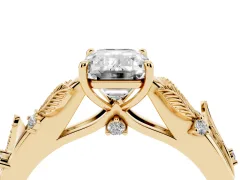 Emerald Cut Diamond Solitaire Ring Set in Yellow gold with Leaf Motif Band
