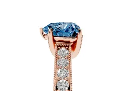 Fancy Blue Heart Cut Diamond Solitaire Ring Set in Rose gold with Milgrain-Edged Pavé Band and Prong Setting
