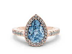 Fancy Blue Pear Cut Diamond Halo Ring Set in Rose gold with Pavé Shoulders and Halo-Framed Center