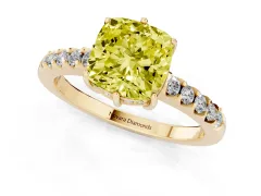 Fancy Yellow Cushion Cut Diamond Solitaire Engagement Ring Set in Yellow gold with Pavé Band and Prong Setting