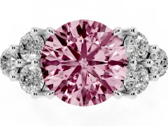 Fancy Pink Round Cut Diamond Solitaire Ring Set in White gold with Cluster Accents on Each Side