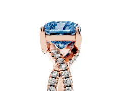 Fancy Blue Cushion Cut Diamond Twist Pavé Solitaire Engagement Ring Set in Rose gold with Prong Setting
