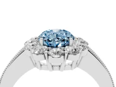Fancy Blue Oval Cut Diamond Halo Pavé Engagement Ring Set in White gold with Milgrain Detailing
