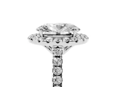 Oval Cut Diamond Pavé Halo Engagement Ring Set in Silver with Pavé Band and Prong Setting