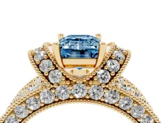 Fancy Blue Emerald Cut Diamond Milgrain Halo Pavé Engagement Ring Set in Yellow gold with Prong Setting