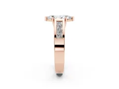 Marquise Cut Diamond Solitaire Ring Set in Rose gold with Channel-Set Accent Stones and Prong Setting
