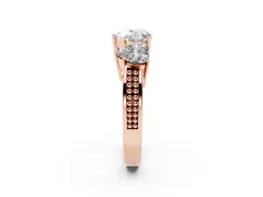 Heart Cut Diamond Three-Stone Ring Set in Rose gold with Textured Band
