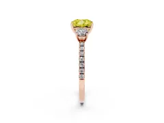 Fancy Yellow Cushion Cut Diamond Three-Stone Ring Set in Rose gold with Pavé Band and Graduated Sides