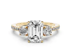 Emerald Cut Diamond Three-Stone Ring Set in Yellow gold with Pavé Band and Graduated Sides