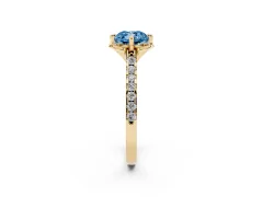 Fancy Blue Cushion Cut Diamond Solitaire Ring Set in Yellow gold with Pavé Band and Floral Prong Setting