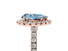 Fancy Blue Pear Cut Diamond Halo Pavé Engagement Ring Set in Rose gold with Prong Setting