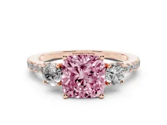 Fancy Pink Cushion Cut Diamond Three-Stone Ring Set in Rose gold with Pavé Band and Graduated Sides