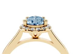Fancy Blue Pear Cut Diamond Halo Engagement Ring Set in Yellow gold with Pavé Band and Rising Shoulders