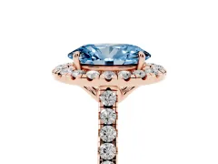 Fancy Blue Oval Cut Diamond Pavé Halo Engagement Ring Set in Rose gold with Pavé Band and Prong Setting
