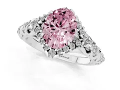Fancy Pink Oval Cut Diamond Solitaire Ring Set in Platinum with Hidden Halo and Pavé Band