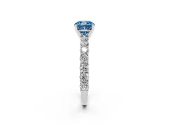 Fancy Blue Cushion Cut Diamond Solitaire Ring Set in Platinum with Shared Prong Pavé Band