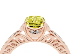 Fancy Yellow Radiant Cut Diamond Halo Ring Set in Rose gold with Channel Set Band and Prong Setting