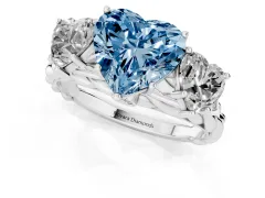 Fancy Blue Heart Cut Diamond Three-Stone Ring Set in Platinum with Braided Band