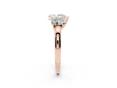 Pear Cut Diamond Three-Stone Ring Set in Rose gold with Bold Center and Classic Band