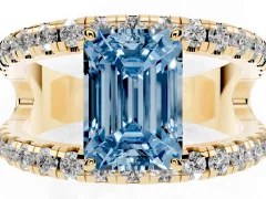 Fancy Blue Emerald Cut Diamond Split Shank Pavé Solitaire Ring Set in Yellow gold with Open Shank Design