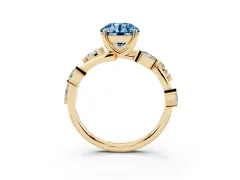 Fancy Blue Round Cut Diamond Solitaire Ring Set in Yellow gold with Twisted Marquise Accent Band