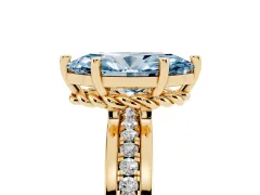 Fancy Blue Marquise Cut Diamond Solitaire Ring Set in Yellow gold with Channel Set Band and Prong Setting