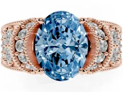 Fancy Blue Oval Cut Diamond Milgrain Halo Pavé Engagement Ring Set in Rose gold with Prong Setting