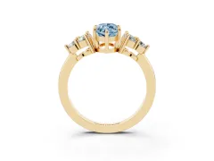 Fancy Blue Marquise Cut Diamond Solitaire Ring Set in Yellow gold with Cluster Accents on Each Side