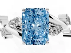 Fancy Blue Radiant Cut Diamond Solitaire Ring Set in Platinum with Twisted Marquise Accent Band