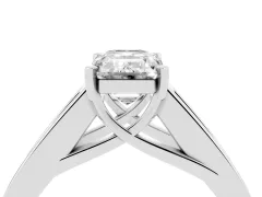Emerald Cut Diamond Solitaire Ring Set in Silver with Channel-Set Accent Stones and Prong Setting