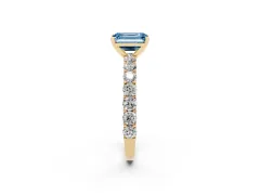Fancy Blue Emerald Cut Diamond Solitaire Ring Set in Yellow gold with Shared Prong Pavé Band