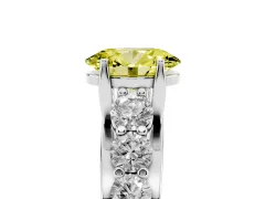 Fancy Yellow Oval Cut Diamond Pavé Engagement Ring Set in Silver with Prong Setting