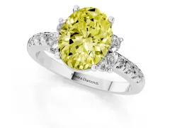 Fancy Yellow Oval Cut Diamond Three-Stone Pavé Ring Set in Silver with Prong Setting