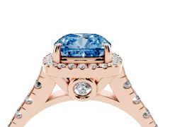 Fancy Blue Cushion Cut Diamond Halo Engagement Ring Set in Rose gold with Pavé Band and Prong-Set Center