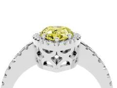 Fancy Yellow Pear Cut Diamond Halo Ring Set in White gold with Pavé Shoulders and Halo-Framed Center