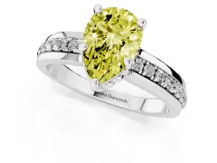 Fancy Yellow Pear Cut Diamond Solitaire Ring Set in Silver with Channel Set Band and Prong Setting