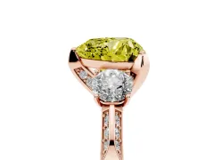 Fancy Yellow Heart Cut Diamond Three-Stone Ring Set in Rose gold with Pavé Band and Smaller Side Stones