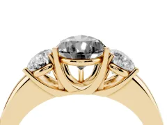 Fancy Black Pear Cut Diamond Three-Stone Ring Set in Yellow gold with Bold Center and Classic Band